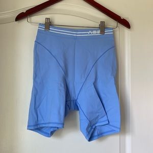 Adam Selman blue biker shorts